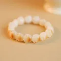 Handcrafted white bodhi root bracelet featuring roasted cat paw shaped beads for women - Cat Claw Style