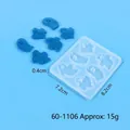 Detail view of Halloween ghost silicone mold with blue resin charms and dimensions - Ghost Shape Mold (60-1106)