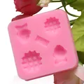 Detail view of pink silicone mold with fish and waffle cavities for baking - Y-10 Style (Y-10) / Pink