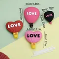 Décoration de gâteau Saint-Valentin avec montgolfière Love en rose et rouge. - Montgolfière LOVE