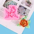 Detail view of pink flower silicone mold and finished orange floral aroma gypsum craft - Camellia Flower Mold (50-2816) / Pink