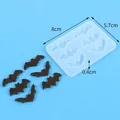 Bat-shaped silicone mold with finished resin bats and dimension markings - Bat Shape Mold (60-1107)