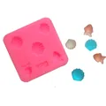 Detail of silicone mold showing shell and fish shapes with colorful finished samples - Y-12 Style (Y-12) / Pink