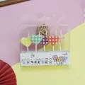 Detailed view of colorful checkered heart-shaped candles in a clear party package - Plaid Heart Style / 5 Pcs Set
