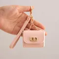 Mini-Schlüsselanhänger aus pinkfarbenem PU-Leder für Münzen und Kopfhörer, goldene Hardware - Hellrosa