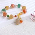 Detailansicht des Jinsiyu Jade-Armbands mit Kürbisperlen und Kürbis-Anhänger - Farbkürbisperle Bambus Flaschenkürbis