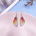 Elegant gradient cicada wing drop earrings with silver hooks and shimmering glitter - Silver Foil Style / Orange Gradient