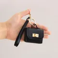 Tragbarer kleiner schwarzer PU-Leder Tasche Schlüsselanhänger für Kopfhörer in der Hand - Schwarz