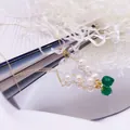 Collier de perles d'eau douce avec pendentif coeur vert en finition dorée - Collier Vert En Forme De Cœur