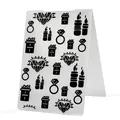Macro view of clear plastic embossing folder featuring diamond and gift box patterns - Birthday Gift Theme
