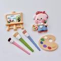 Süßes Weichgummi-Tortenfiguren-Set mit Malerschwein, Staffelei und Pinseln - 6-Teiliges Set