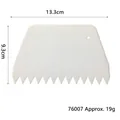 White serrated plastic cake scraper 13.3cm width and 9.3cm height dimension details - Trapezoidal Large Sawtooth Scraper (76007) / White