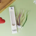 Set of 6 colorful wavy curved birthday cake candles with metallic finish in packaging. - Gradient Dazzling Colors