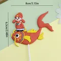 Traditional scholar riding a koi fish soft rubber cake topper for graduation party decor - Koi Fish Scholar / 1 Piece