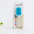 Vibrant blue number 8 birthday candle in retail packaging for party cake decoration - Blue Number 8