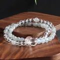 Close-up of natural crystal double-layer bracelet with moonstone and rose quartz beads - Grey Moonlight White Crystal Strawberry Quartz Bracelet