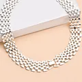 Close-up detail of silver-toned punk hip hop wide chain necklace with hollow links - Silver