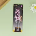 Vela de cumpleaños número 3 rosa metalizado con corona y lazo en el paquete - Corona Número 3 / Rosa