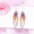 Ohrringe aus S925 Sterling Silber mit Zikadenflügeln, Farbverlauf und Kristallen - Silber Strass Zikadenflügel Stil / Champagner