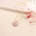 Elegante collana vintage con ciondolo in perla d'acqua dolce viola e catena dorata. - Viola Oro