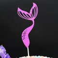 Detailed view of a pink glitter mermaid tail cake topper on a black background - Rose Red / 1 Piece