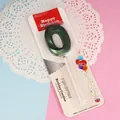 Vela de cumpleaños número 0 verde metalizada con un elegante embalaje de cartón - Número 0 / 1 Pieza / Verde oscuro