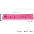 Detailed view of pink silicone fondant lace mold with specific dimensions 20.5x4.5cm - Pink (50-170-A)