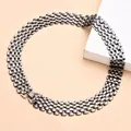 Detailed close-up of a gunmetal-tone wide mesh link necklace in punk hip-hop fashion style. - Gun Black