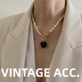 Collana vintage di perle naturali con ciondolo a cuore verde scuro e montatura oro. - Verde smeraldo