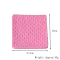 Detail view of pink silicone fondant mold featuring intricate woven texture pattern - Pink (50-608-A)