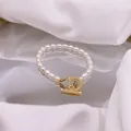 Elegant French style baroque freshwater pearl necklace with golden OT toggle clasp detail - Rice Pearl Bracelet / Bracelet / White