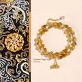 Elegant double-strand golden tiger eye beaded bracelet featuring 6mm stones and charms - Golden Tiger Eye Double Wrap Bracelet / 6mm