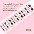 Detailed shot of 30pcs press-on nails featuring black stars and silver glitter accents - Black and White Star Contrast Glitter Style (S070-T) / 30 Packs