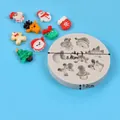Christmas themed silicone mold featuring Santa, snowman, and reindeer shapes for crafts - Holiday Icon Series (50-3312-B) / 50-3312-B