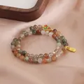 Bracciale a doppio giro in quarzo rutilato naturale con ciondolo dorato portafortuna Fu - Quarzo Rutilato Multicolore