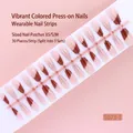 Detailed view of 30pcs nude and burgundy French press-on nails on a sizing strip - Wine Red Gradient Slanted French Style (S073-T) / 30 Packs