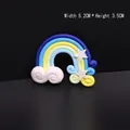Kleurrijke handgemaakte regenboog taarttopper van polymeerklei met sterren en wolken - Blauw Gele Ster