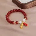 Natürliches rotes Achatperlenarmband mit goldenen Erdnussanhängern im klassischen chinesischen Stil - Glücksbringer Erdnuss Stil (Natürlicher Roter Achat)
