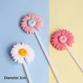 Macro view of resin daisy cake toppers with 3cm diameter for dessert decoration - Red Pink White Set (3 Pieces)