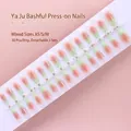Macro view of 30 gradient peach and mint green press-on nails on a display strip - Elegant Orange Mint Green Gradient New Chinese Style (S093-T) / 30 Packs