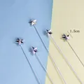 Nahaufnahme der 1,5 cm großen silbernen 3D-Stern-Kuchentopper mit Größenangabe. - 3D Stern / 5er Pack / Silber