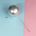 Close-up detail of silver decorative cake ball insert with 4cm diameter dimension - 4cm (1 Piece) / Silver