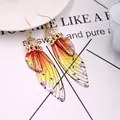 Elegante lange Schmetterlingsflügel-Ohrringe mit Farbverlauf und Strasssteinen in Gold - Gold - Oranger Strass