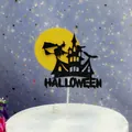 Close-up detail of Halloween witch and haunted castle cake topper for party decoration - Witch Castle Style
