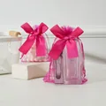 Elegant magenta organza drawstring gift bag with a large satin bow for jewelry storage - 9x12cm / Rose Red
