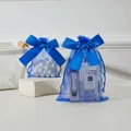 Elegant blue organza jewelry pouch with large ribbon bow and drawstring closure for storage - 9*12cm (10 Pcs/Pack) / Sapphire Blue