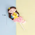Detail showing the 7.5cm height of the cute girl soft clay cake topper decoration. - Girl with Star