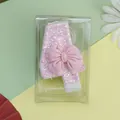 Vela de cumpleaños número 4 rosa con lazo y purpurina en caja - Vela de Número Lazo Rosa 4