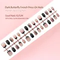 Set of 30 dark butterfly French style press-on nails available in XS, S, and M sizes - Dark French Butterfly Style (S121-T) / 30 Pieces/Strip (Includes XS/S/M Sizes) / Nude Pink/Black