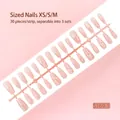 Gedetailleerd macro-overzicht van 30 roze sterrenhemel press-on nagels in maten XS/S/M - Starry Sky Style (S169-T) / 30-delige Set (XS/S/M Maten) / Nude Pink Starry Moon